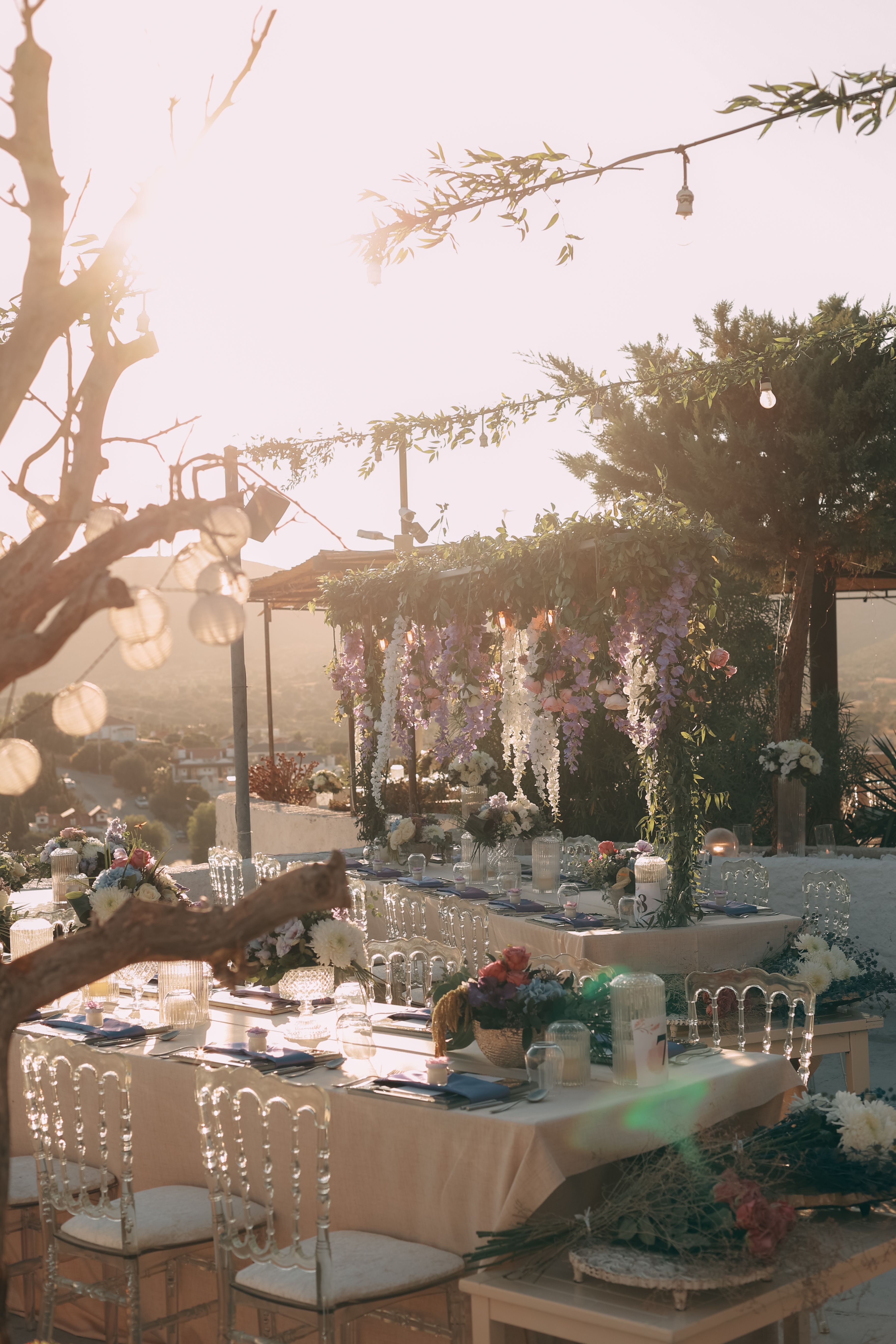 Intimate Napa Valley reception table beside a vineyard estate