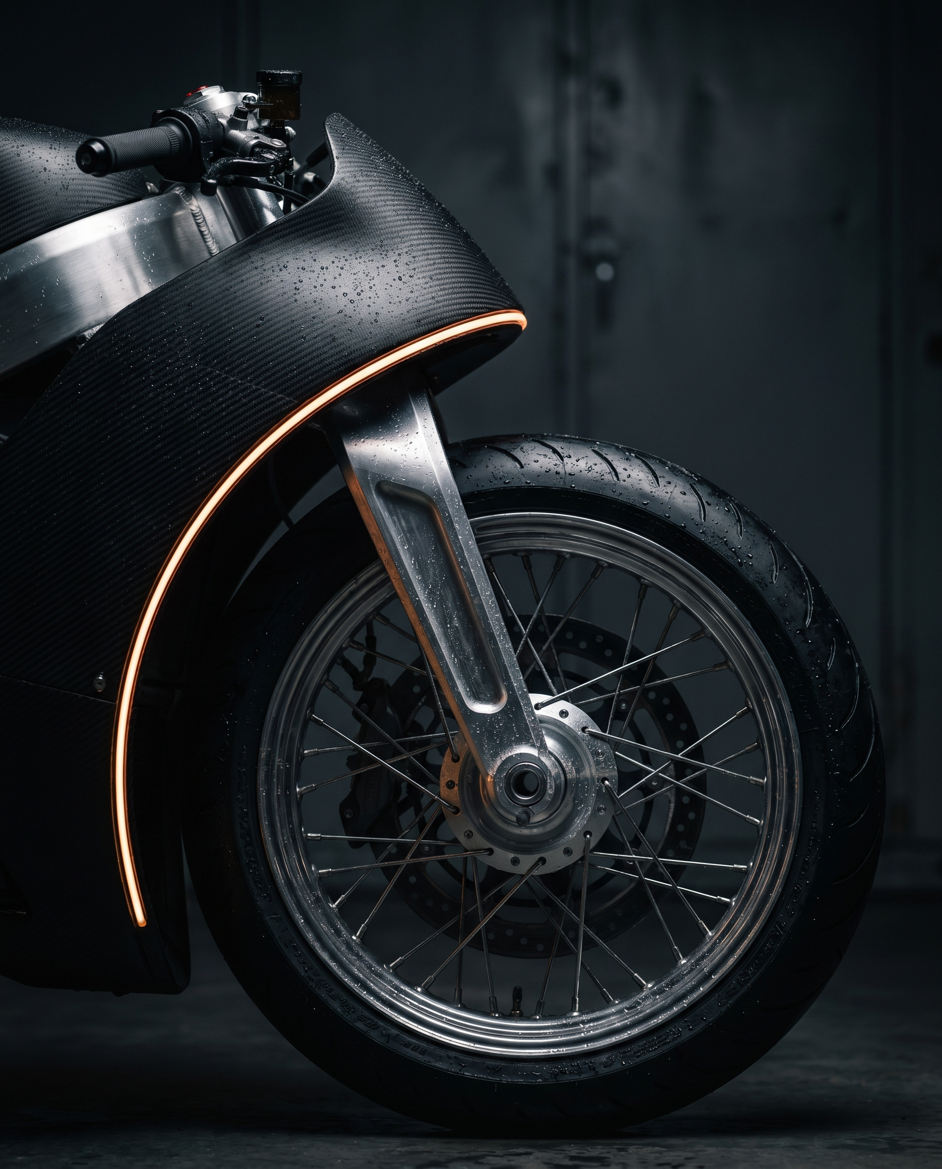Milled aluminum hub-center steering detail with amber accent